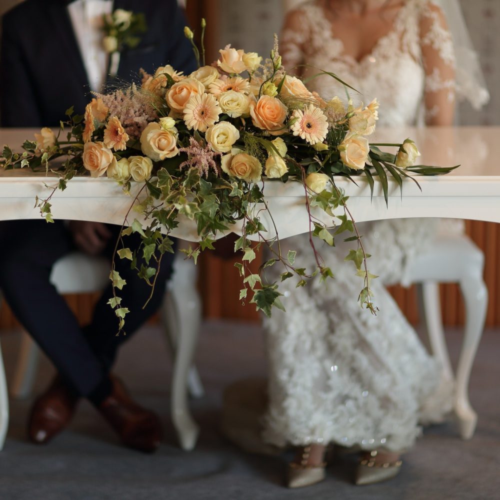 Decorated table with flowers for the wedding ceremony